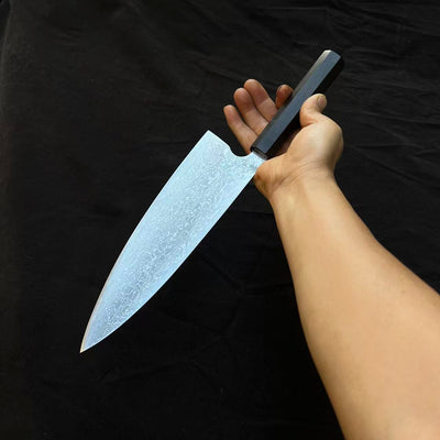 Handmade forging of a hundred steel chef's ox knife